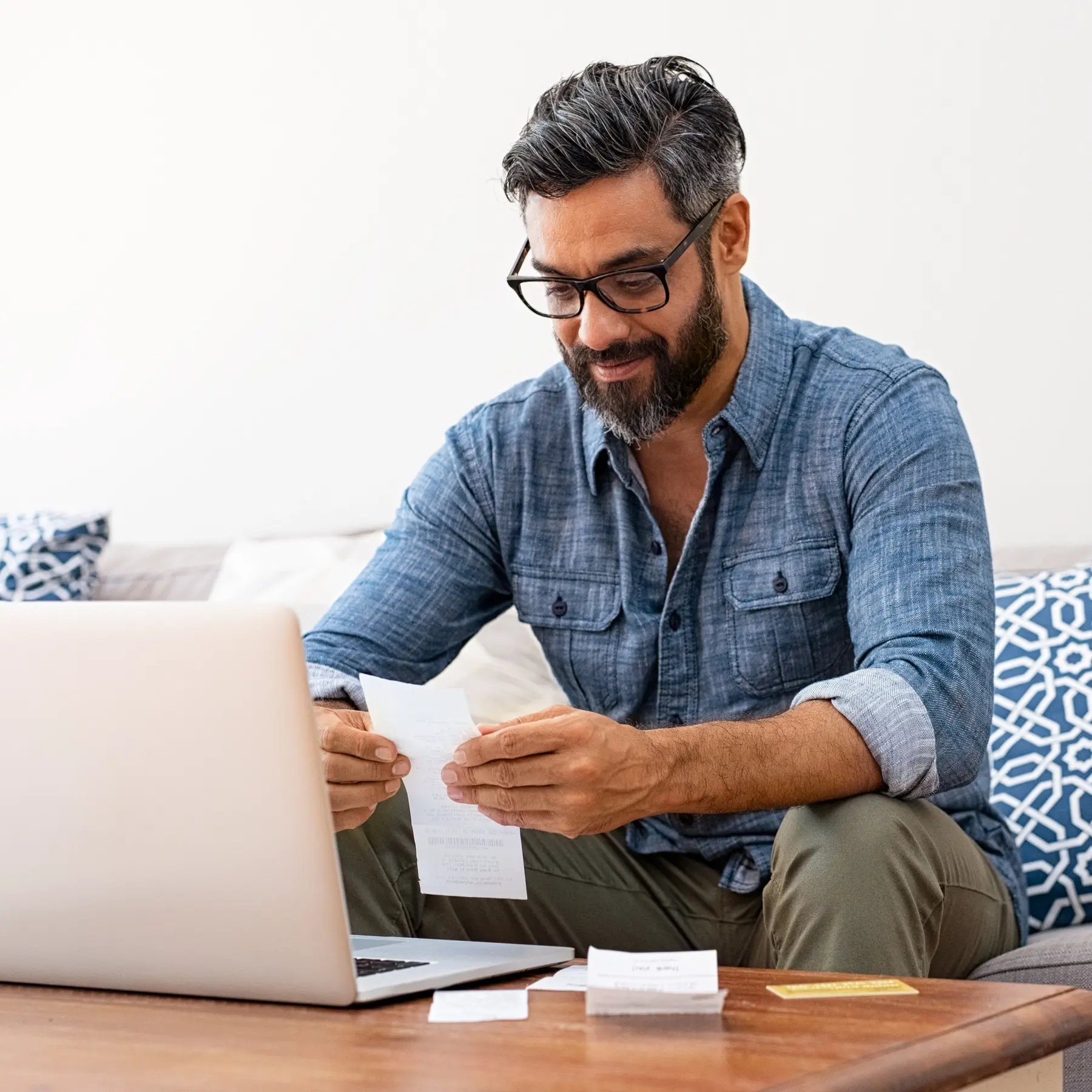 Computer_Middle age man with receipts
