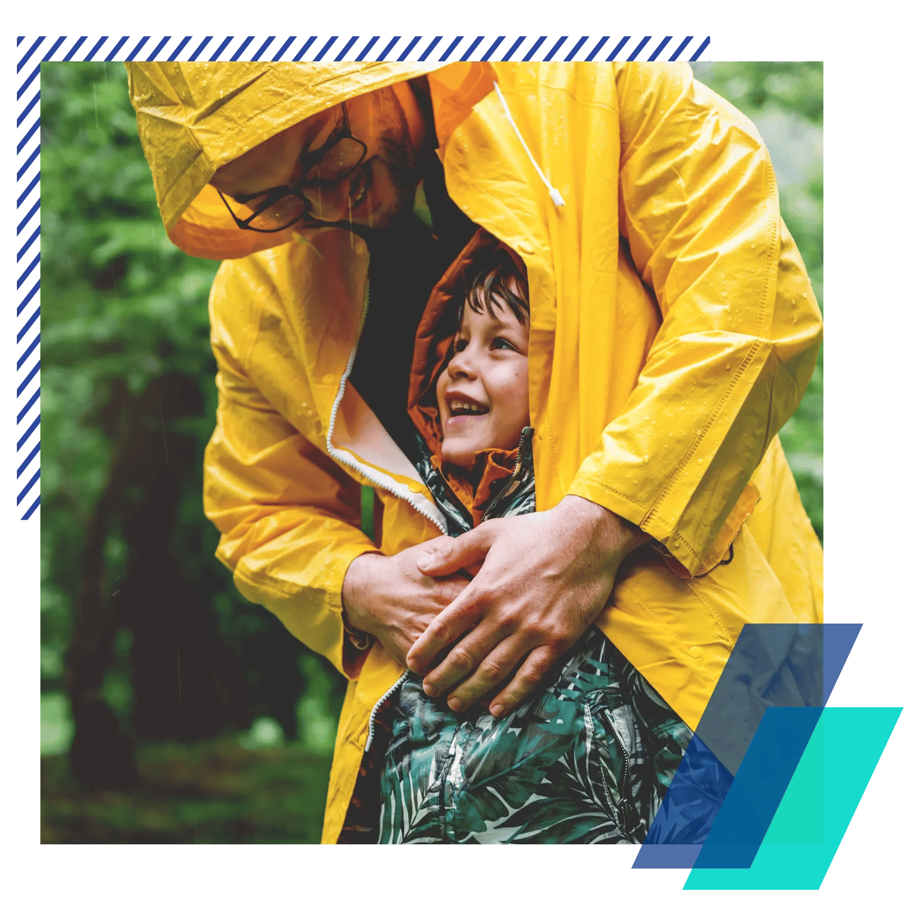 Father and son in raincoats taking shelter from the storm