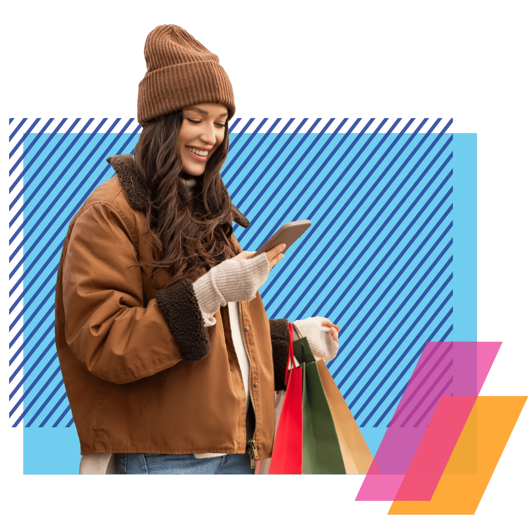 woman smiling at phone with holiday shopping bags in hand