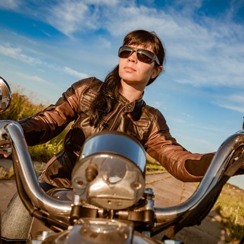 motorcycle-financing-through-allegiance-credit-union-is-easy-young-woman-riding-her-motorcycle