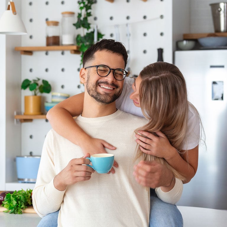 A Home Equity Loan-offers-peace-of-mind-for-this-couple-sitting-having-coffee.