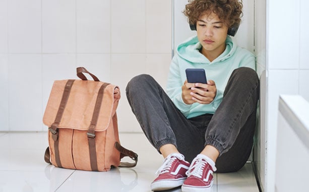 Boy-on-phone-with-free-financial-counseler-from-allegiance