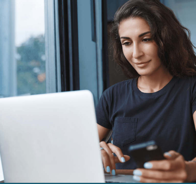 Young woman checking her credit card bill online