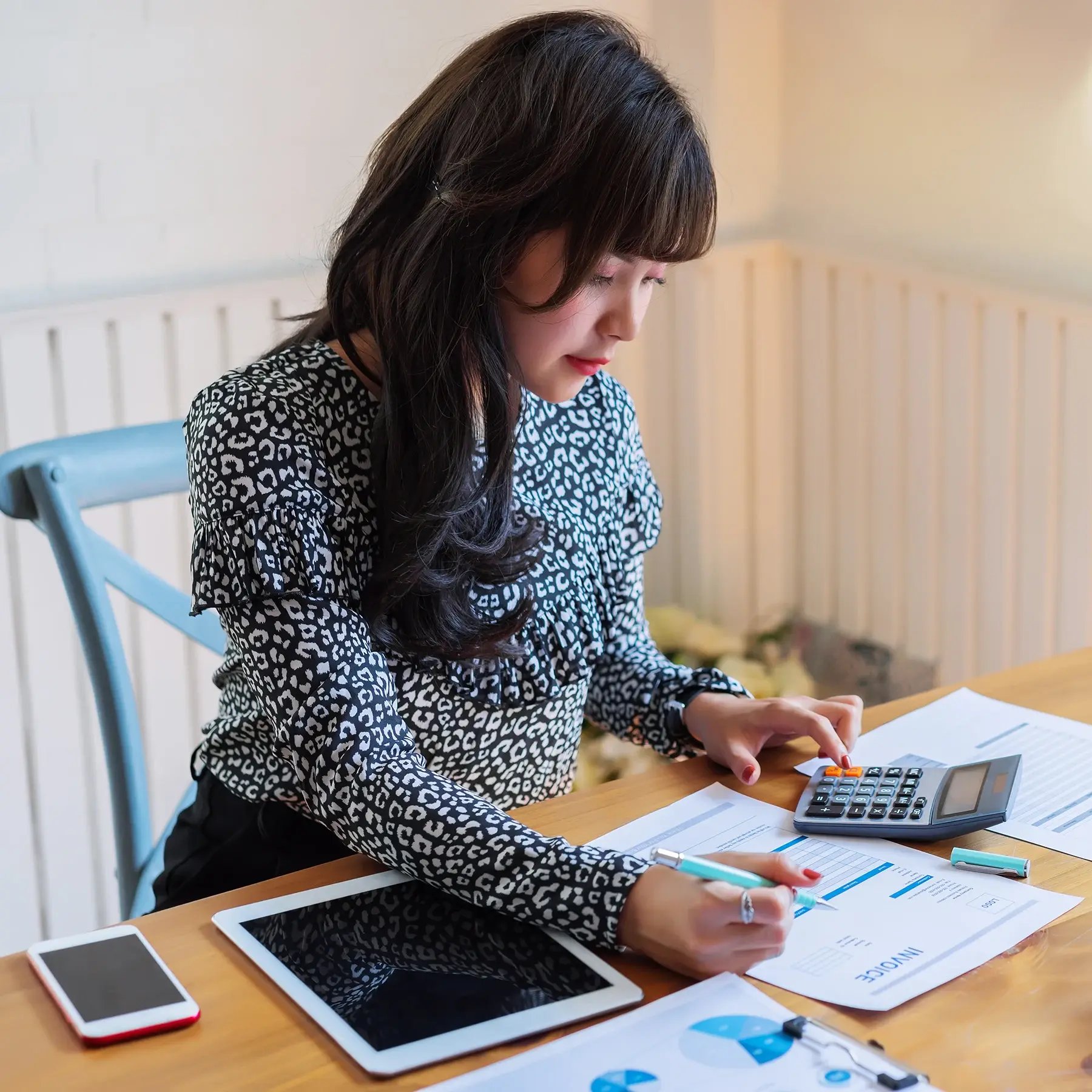 happy-beautiful-asian-accountant-woman-working-about-financial-with-business-report-calculatorfinancial-accounting-concept