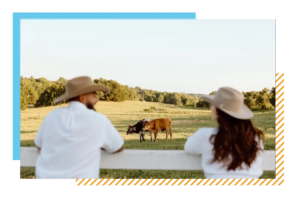 Couple looking out over Oklahoma ranch