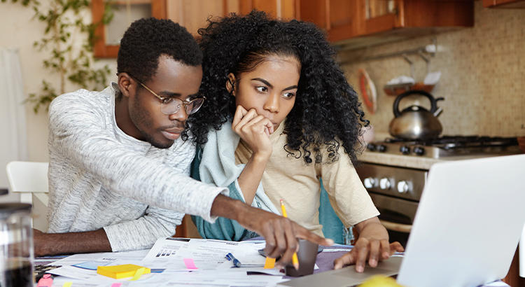 Couple looking over tax forms