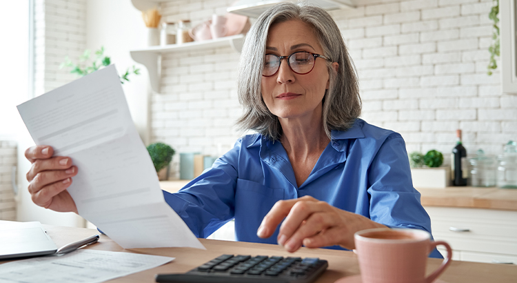 Women looking over bills