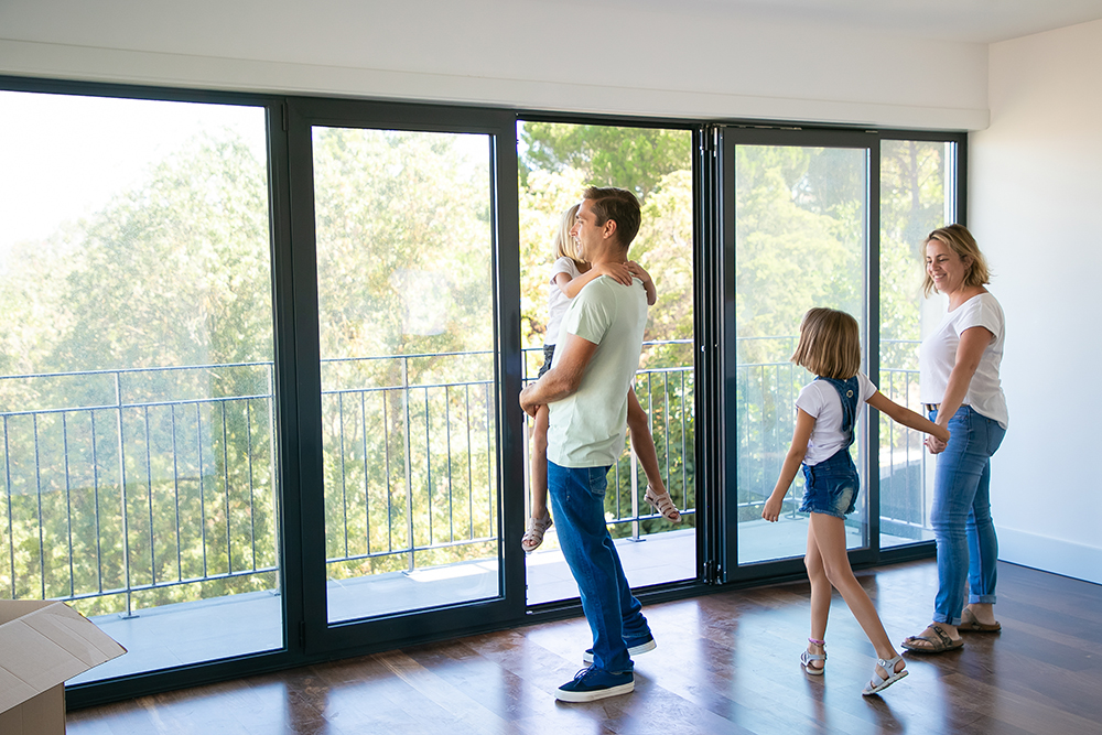 family looking at house