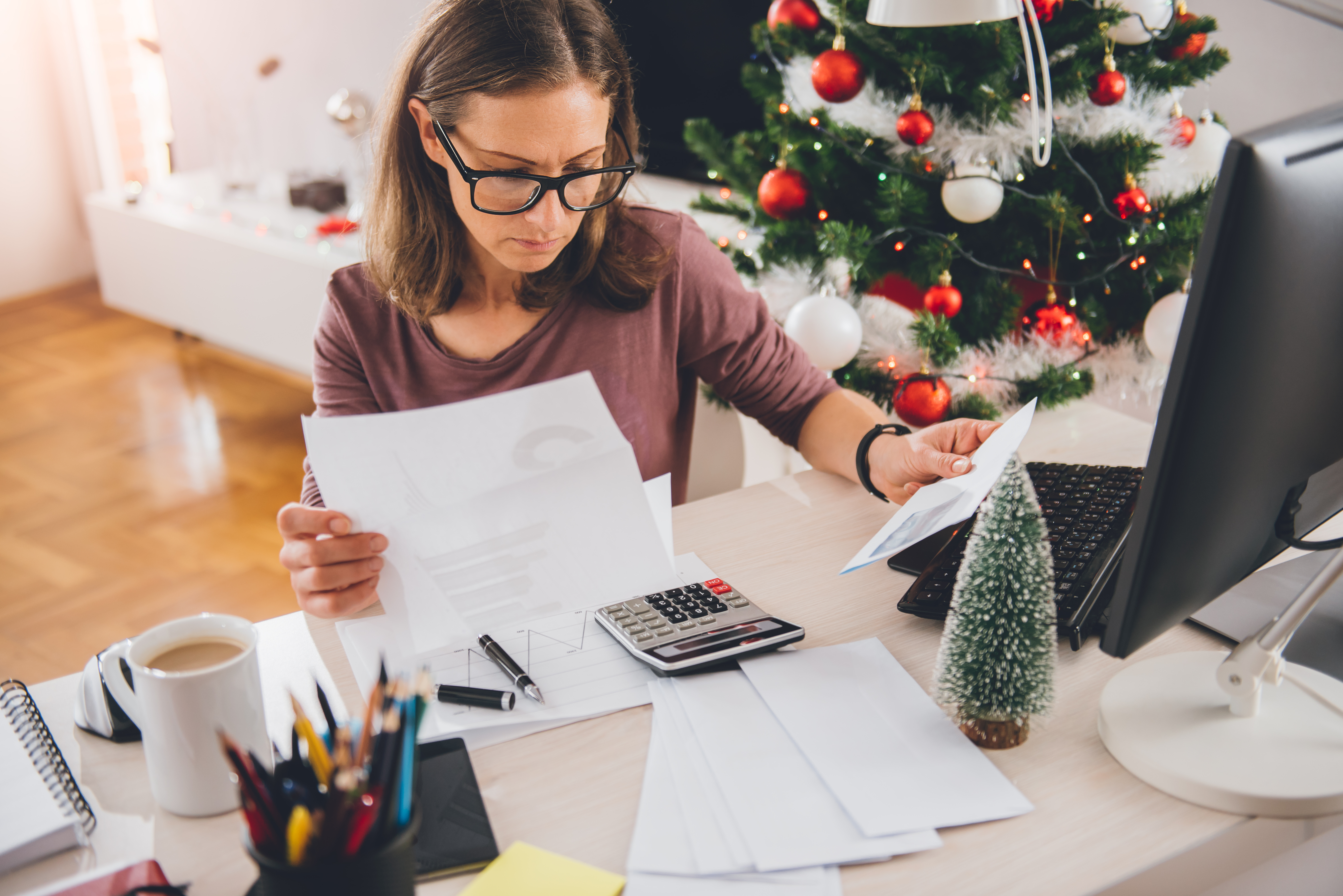 woman going over holiday bills