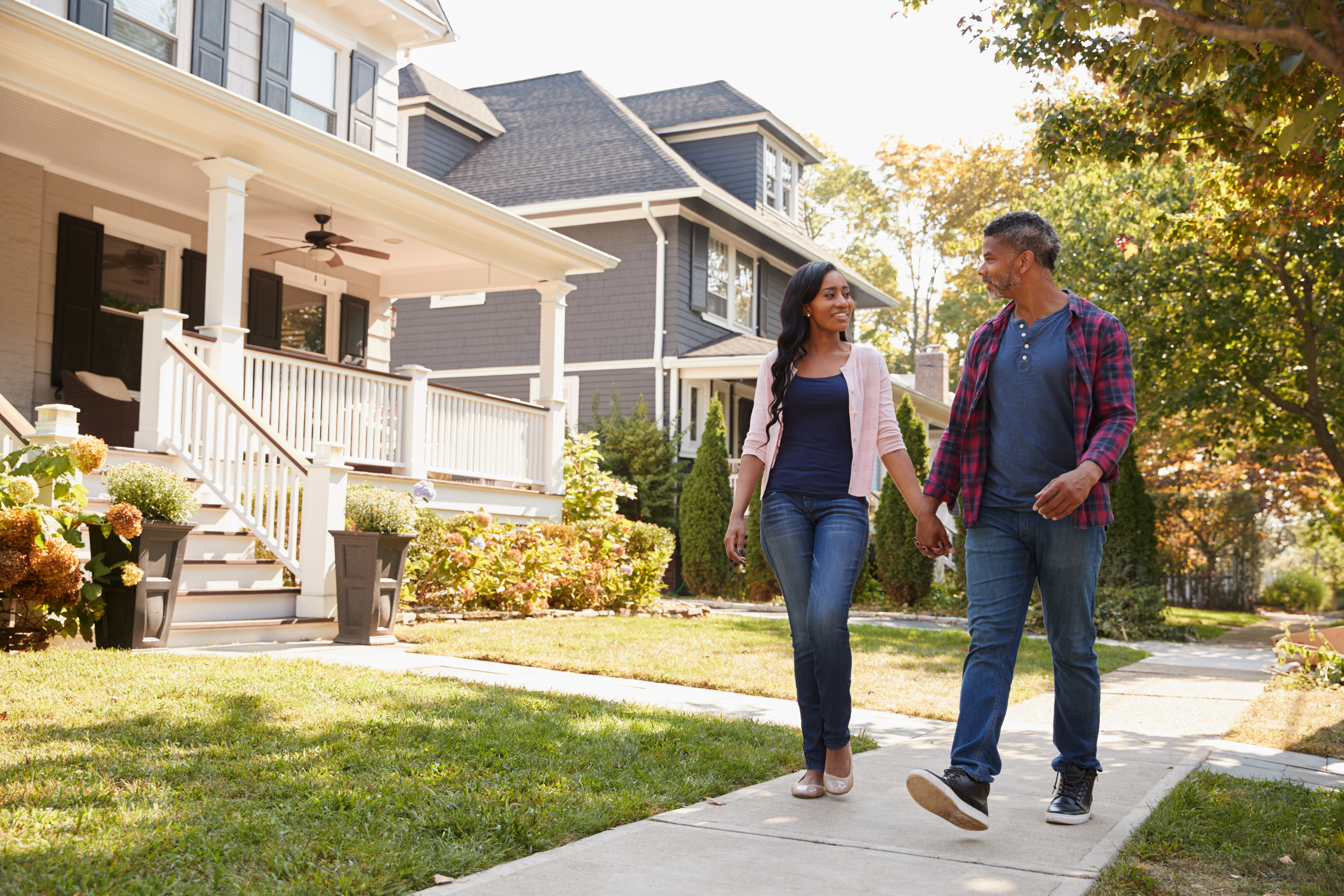 Couple walking in the neighborhood